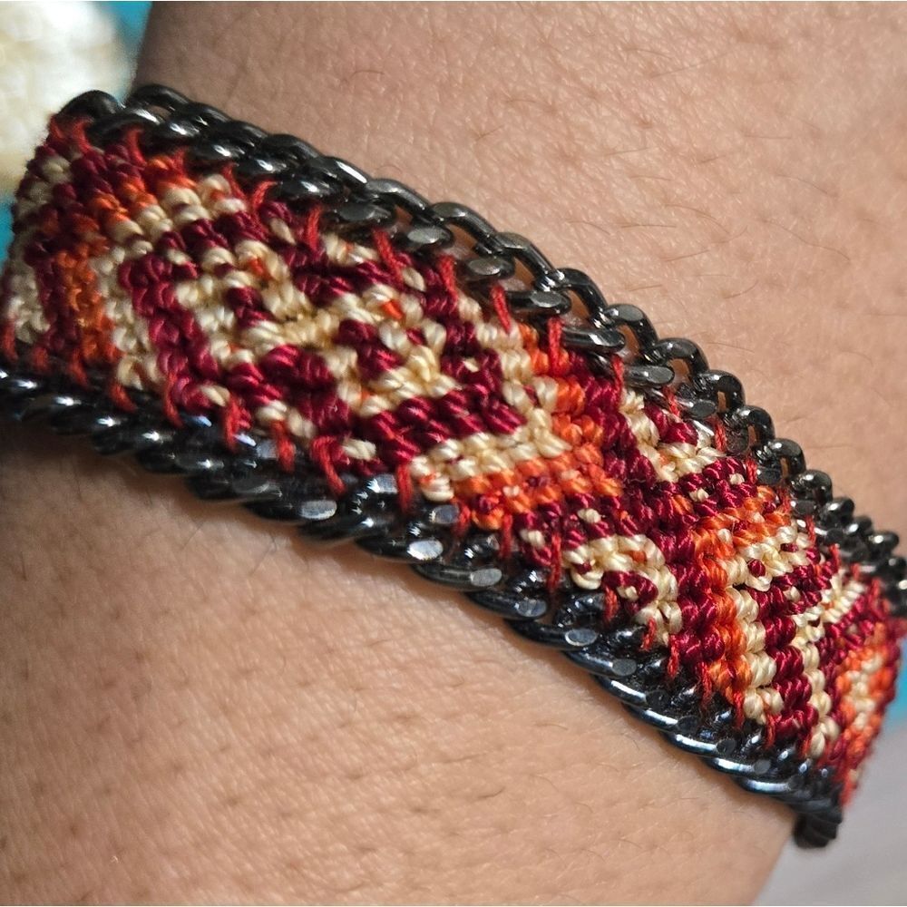 Unisex Pony express woven bracelet with chain lining.